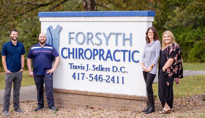 Chiropractor Forsyth MO Travis Sellers With Team